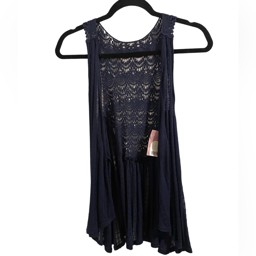 Red Camel sleeveless cardigan with lace back.
